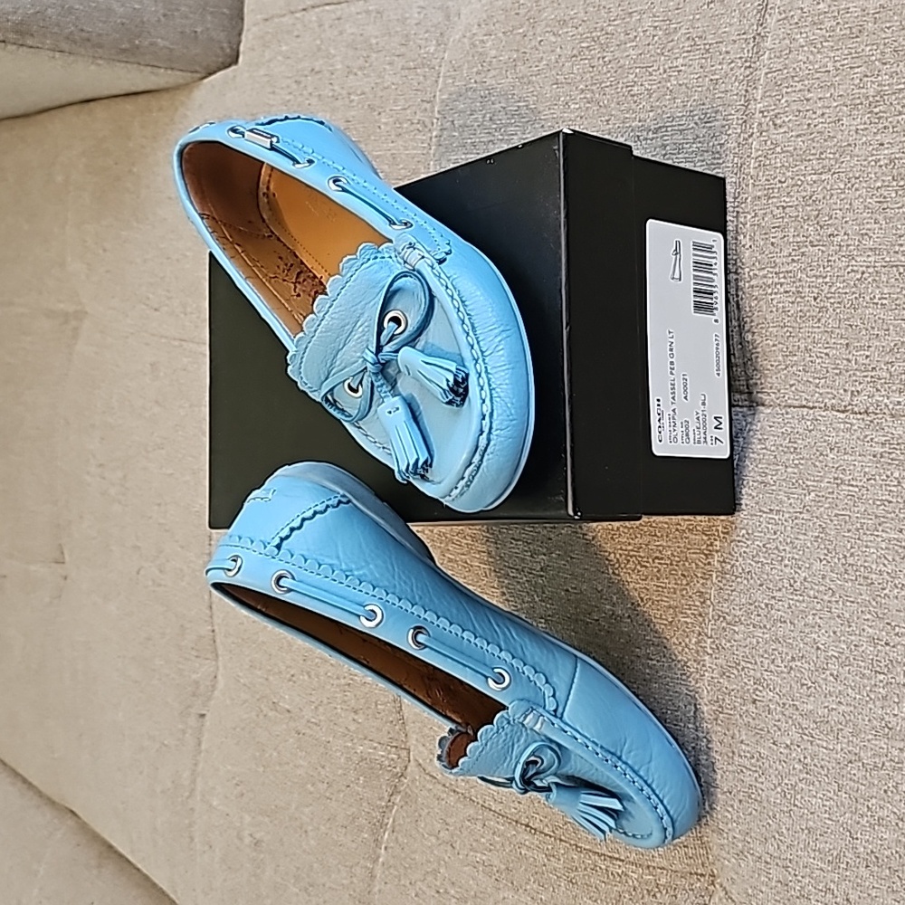 Women's Coach loafers Size 7m baby blue tassles